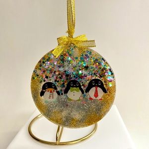 Handmade resin penguin ornament